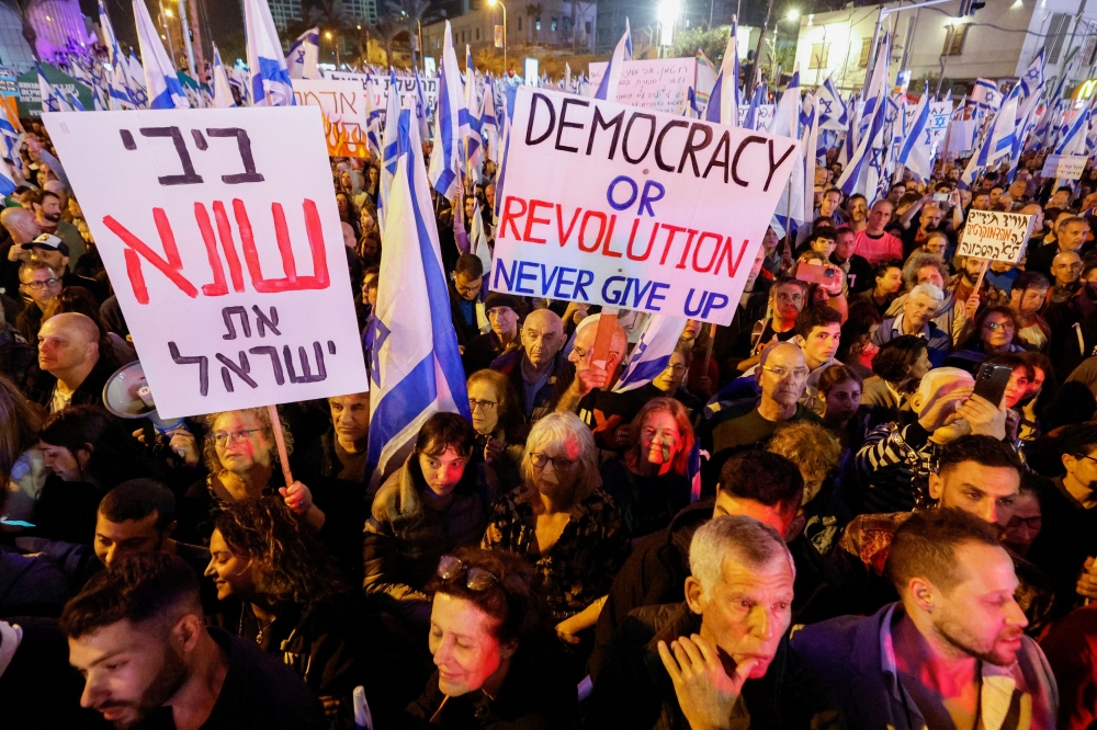 Tens of thousands of protesters took to the streets of Israeli cities for the ninth straight week on Saturday to fight a government plan to overhaul the country’s court system. — Reuters pic