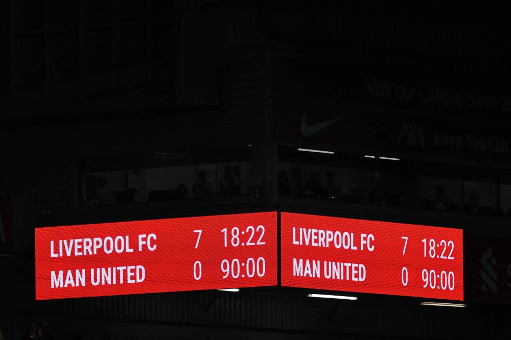 The scoreboard shows the final score, 7-0 after the English Premier League football match between Liverpool and Manchester United at Anfield in Liverpool, north west England on March 5, 2023. — AFP pic 