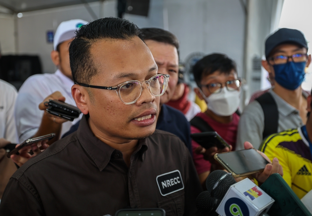 Natural Resources, Environment and Climate Change Minister Nik Nazmi Nik Ahmad speaks to the media after officiating the Our Nature Carnival (Karnival Alam Kita) at the Batu Kawan Stadium March 12, 2023. — Bernama pic