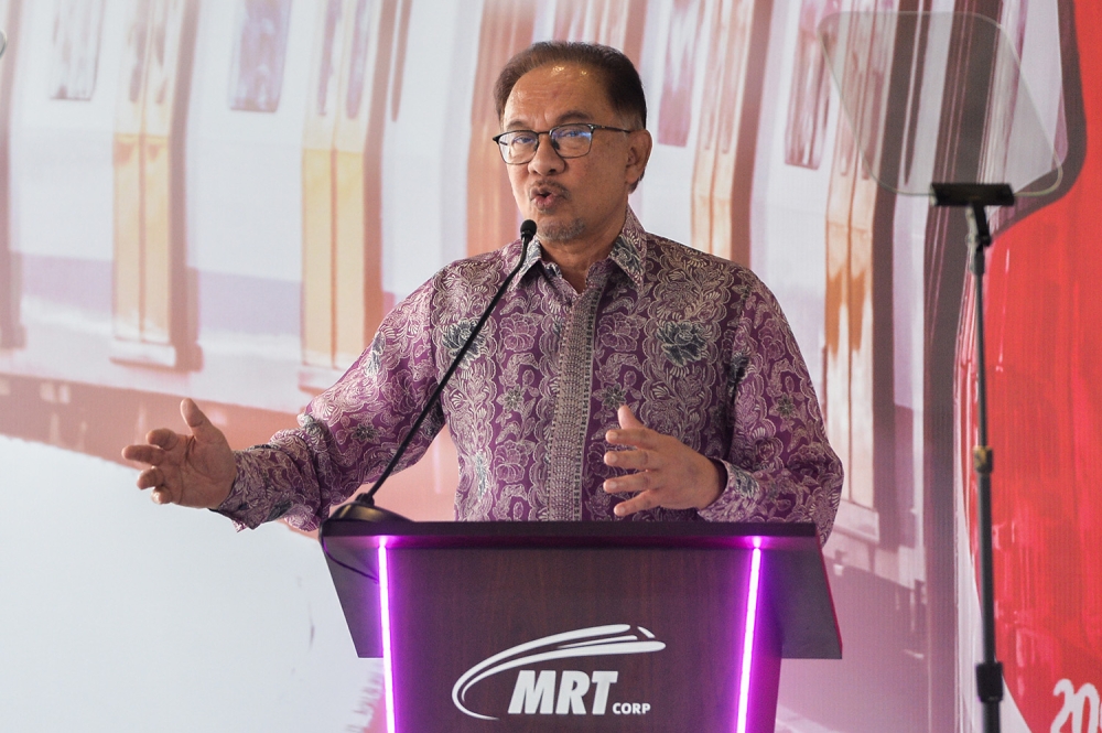 Prime Minister Datuk Seri Anwar Ibrahim speaks during the launch of MRT2 Phase Two at the Serdang Depot March 16, 2023. — Picture by Miera Zulyana 