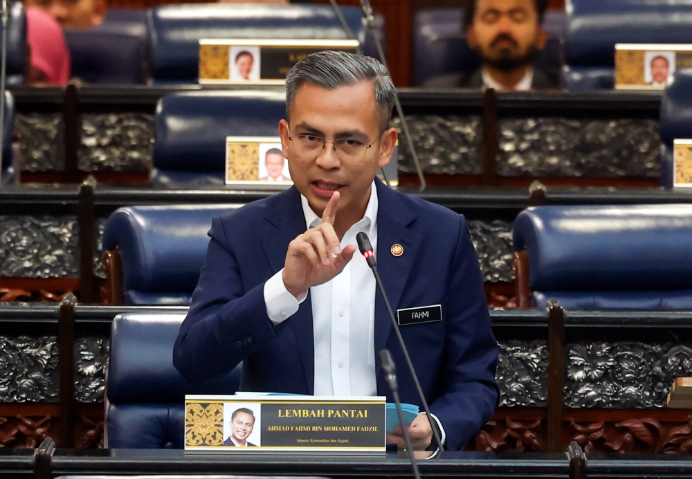 Communications and Digital Minister Fahmi Fadzil speaks during the Dewan Rakyat sitting in Kuala Lumpur March 16, 2023. ― Bernama pic