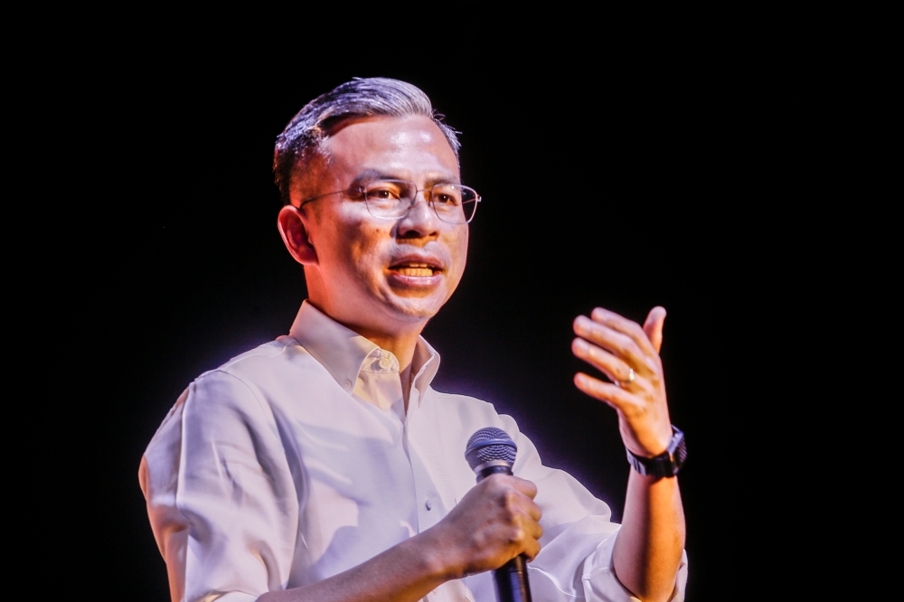 Communications and Digital Minister Fahmi Fadzil gives his speech during the Central Agency for the Application of Filming and Performance by Foreign Artistes (Puspal) town hall meeting at The Bee, Publika March 16, 2023. — Picture by Hari Anggara