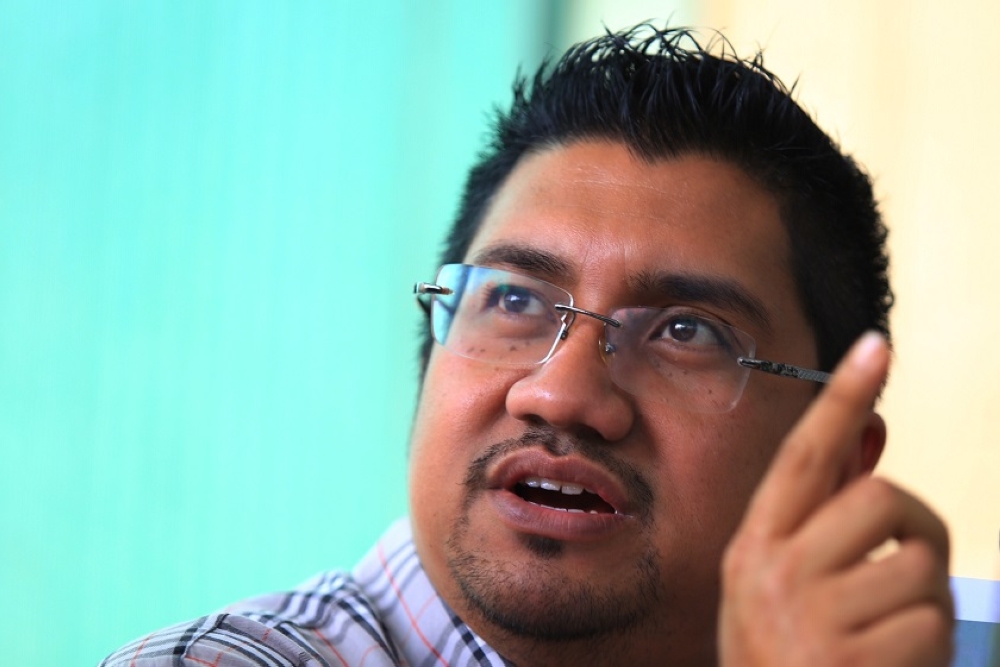 This 2014 file photograph shows Badrul Hisham Shaharin speaking at a press conference in Kuala Lumpur. The Bersatu member is now under a police investigation. — Picture by Saw Siow Feng