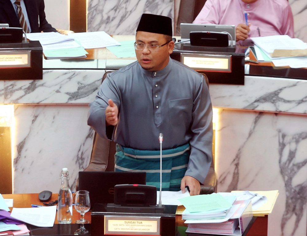 Selangor Menteri Besar Datuk Seri Amirudin Shari speaks during the State Legislative Assembly sitting in Shah Alam March 17, 2023. — Bernama pic