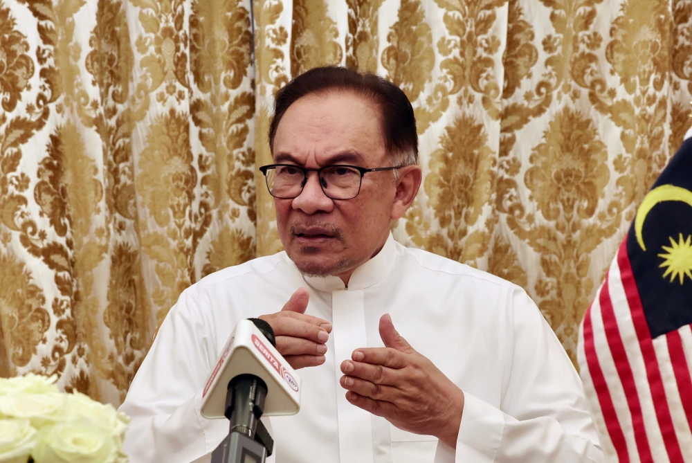 Prime Minister Datuk Seri Anwar Ibrahim at a media conference in Mecca. — Bernama pic