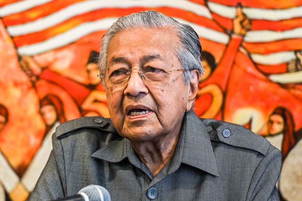 Tun Dr Mahathir Mohamad speaks at a press conference in Putrajaya March 28, 2023. — Picture by Miera Zulyana