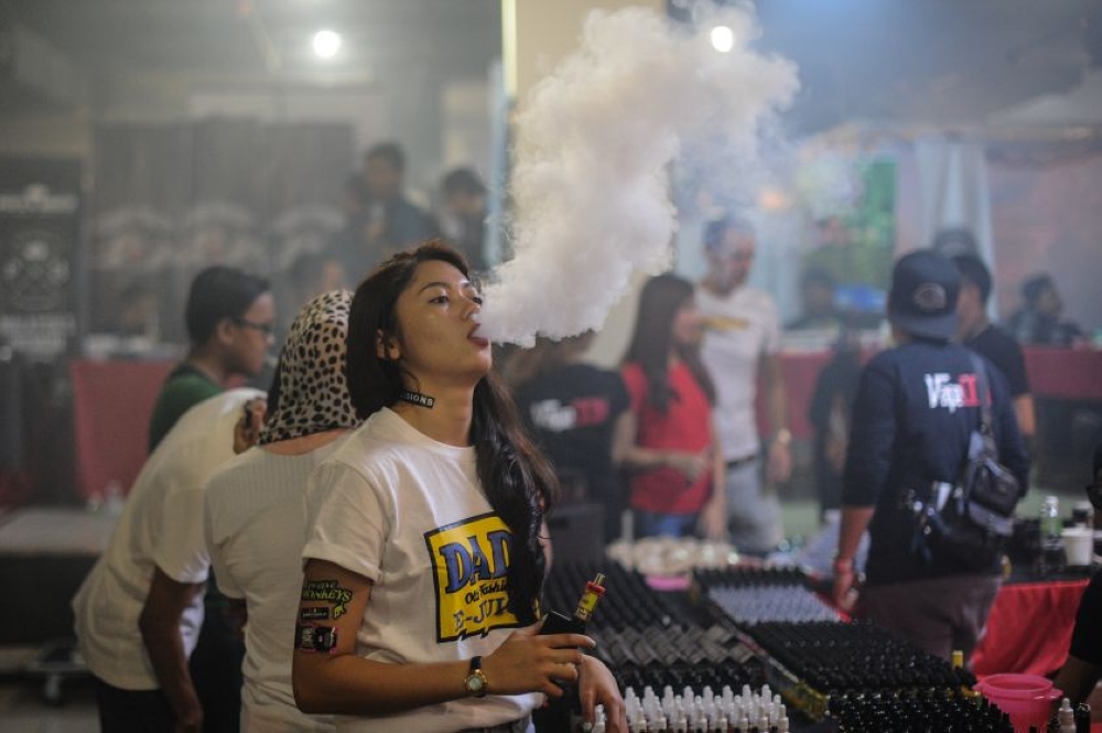 The Malaysian Medical Association is worried that removing nicotine from this list of controlled substances under the Poisons Act will allow any vape — both containing nicotine and non-nicotine — to be sold openly and legally to anyone including children. —  AFP file pic