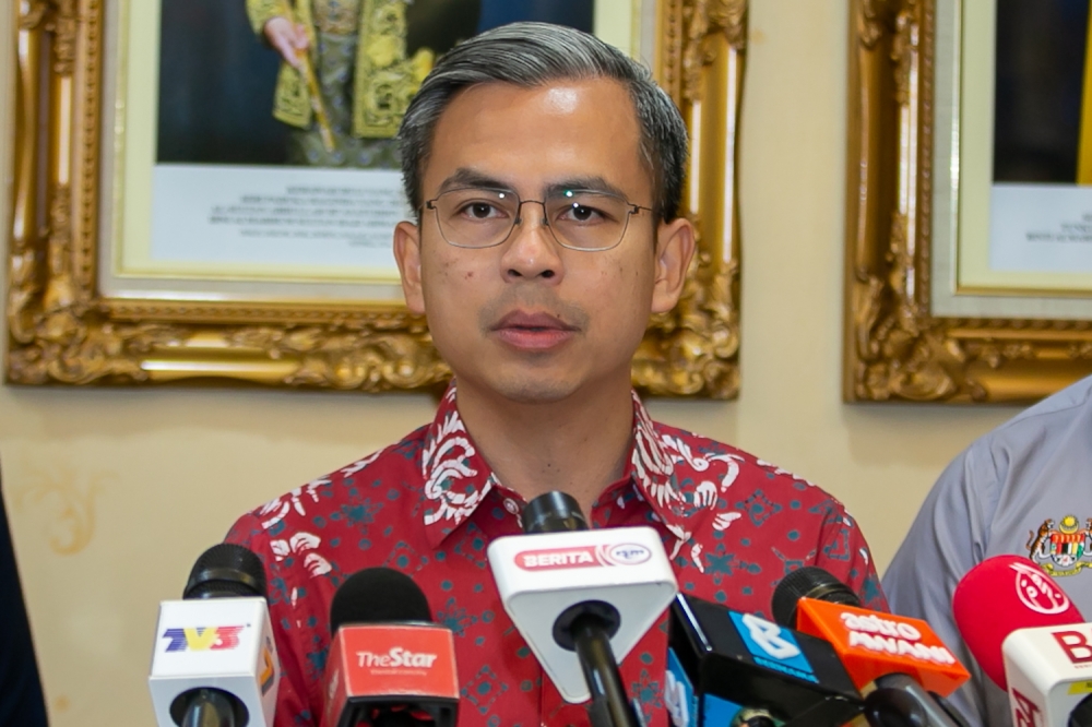 Communications and Digital Minister Fahmi Fadzil said he hoped the initiative will be able to alleviate the burden of vulnerable groups and allow them to access the internet at a cheap price. — File picture by Raymond Manuel