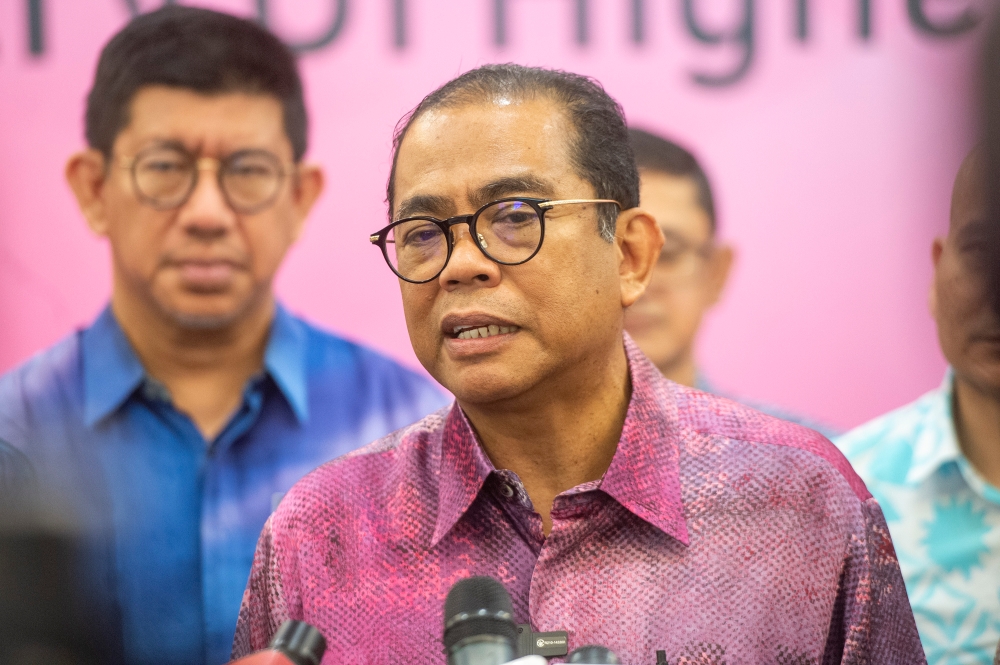 Datuk Seri Khaled Nordin answers media questions during press conference after the townhall session on Universities and University Colleges Act 1971 at Ministry of High Education April 6, 2023. — Picture by Shafwan Zaidon