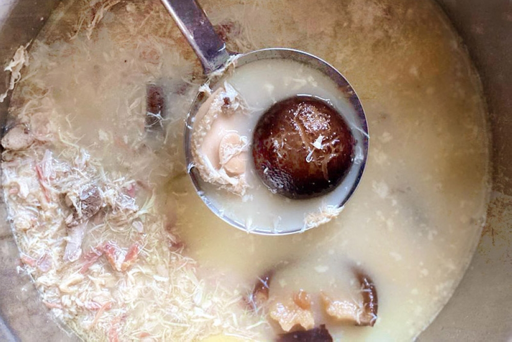 Leftover chicken soup can be the base for the quick and easy chicken rice.