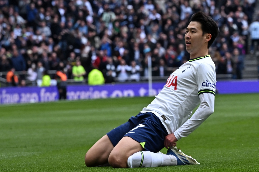 Tottenham Hotspur's South Korean striker Son Heung-Min celebrates after scoring the opening goal of the English Premier League football match between Tottenham Hotspur and Brighton and Hove Albion at Tottenham Hotspur Stadium in London, on April 8, 2023. — AFP pic