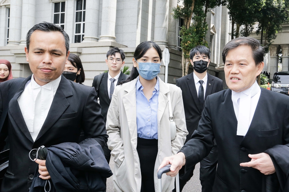 The panel chaired by Datuk Hadhariah Syed Ismail ruled in favour of Sam Ke Ting’s (centre) appeal and cancelled her six-year jail sentence and RM6,000 fine. — Picture by Sayuti Zainudin