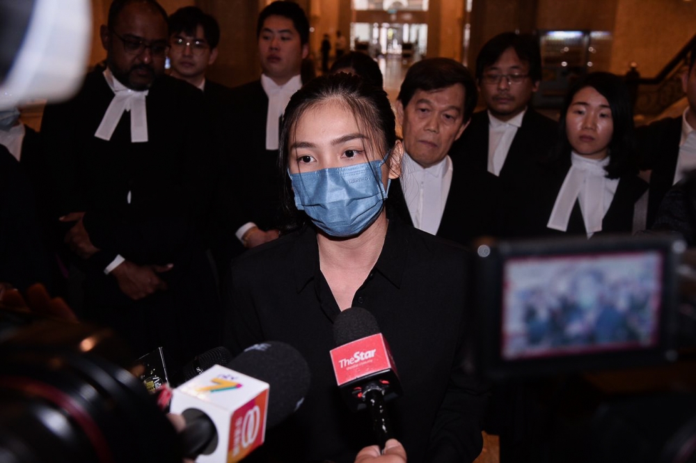 Sam Ke Ting speaks to reporters after the Court of Appeal announced her as innocent of any crimes today.