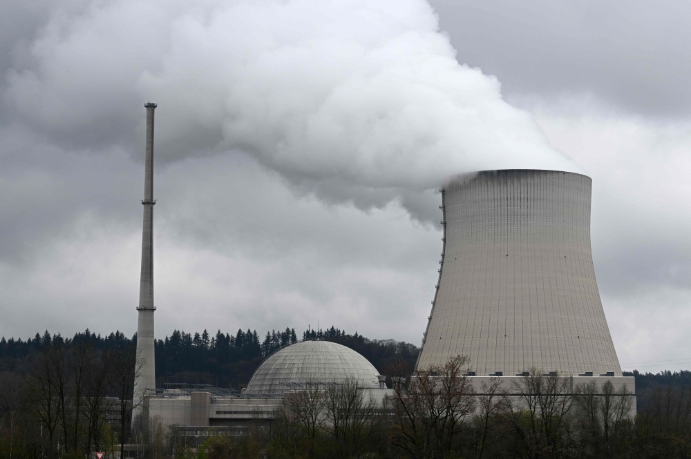 A photo taken on April 14, 2023 shows the nuclear power plant Isar in Essenbach near Landshut, southern Germany. The country will shut down its three remaining nuclear plants today. — AFP pic