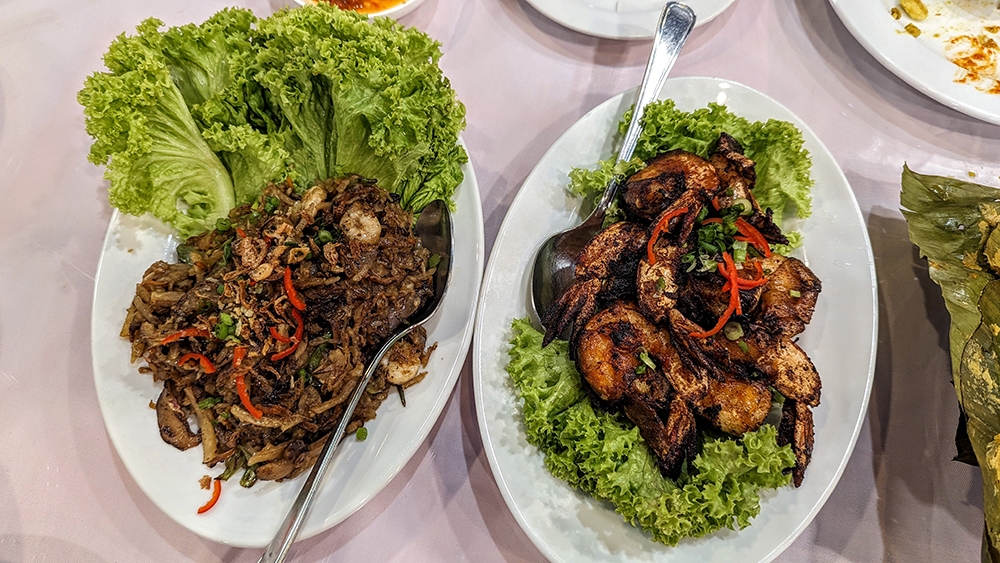 Life-changing 'ju hu char' on the left and fried 'assam' prawns on the right.