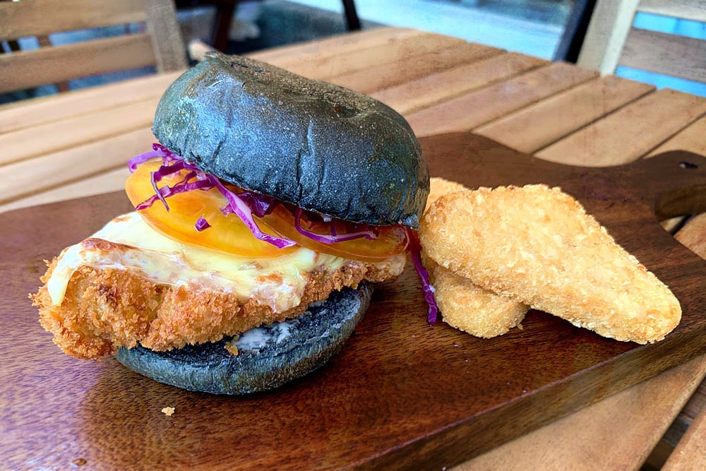 Go-Chook-Jang Burger with crispy breaded chicken thigh and gochujang sauce.