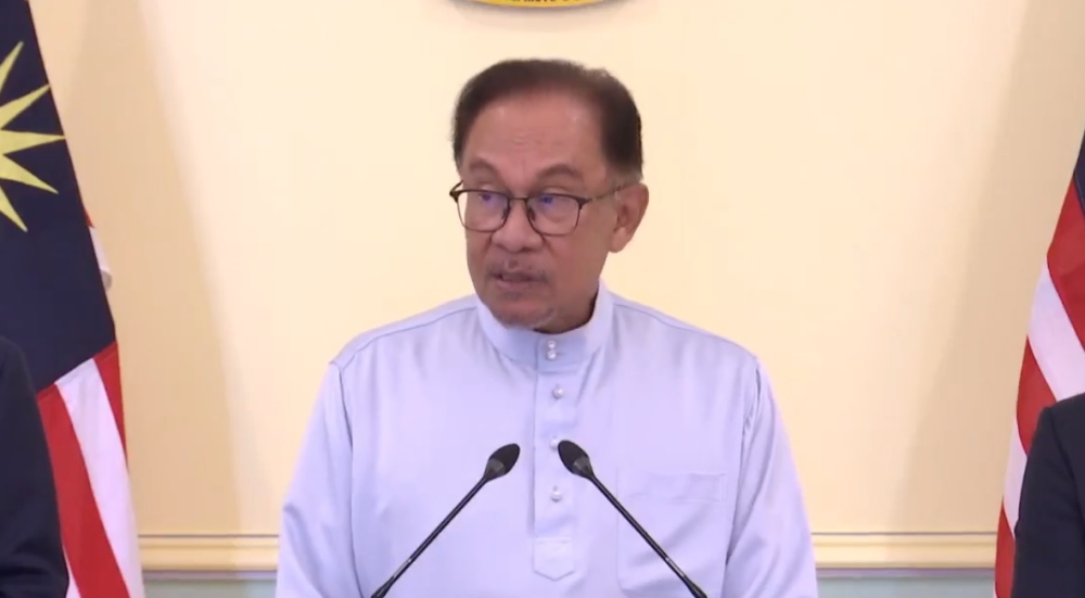 Prime Minister Datuk Seri Anwar Ibrahim speaks during press conference livestreamed on Radio Television Malaysia's Facebook page. ― Screenshot via Facebook/Radio Television Malaysia