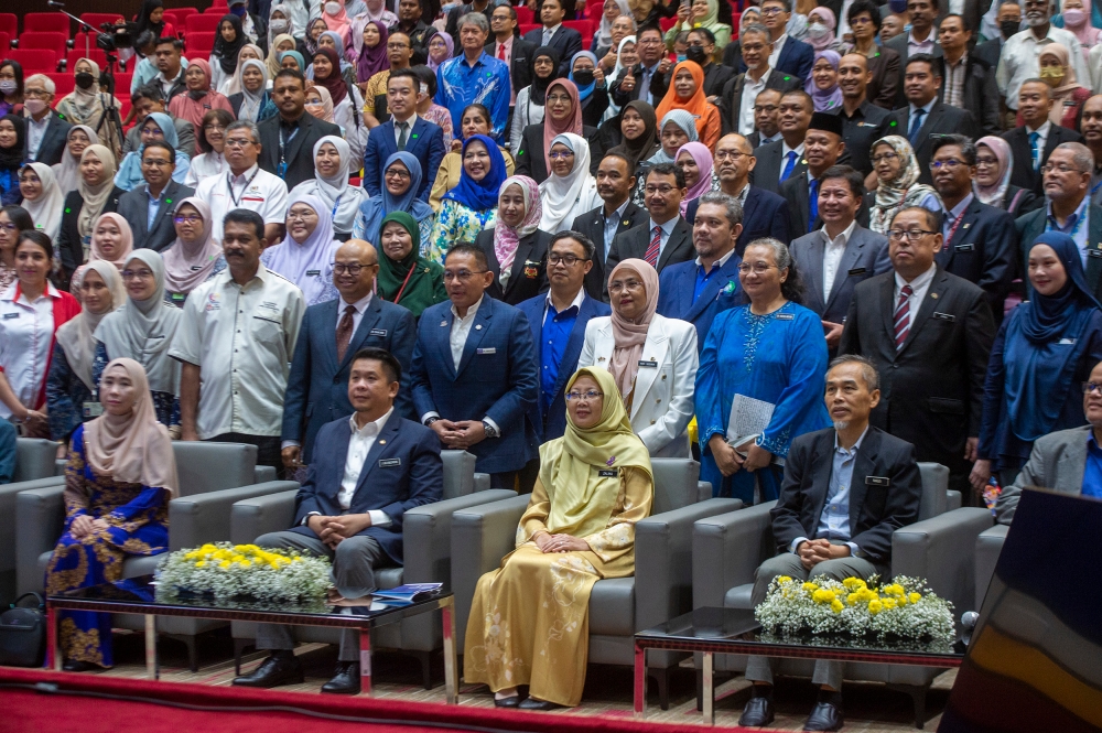 Health Minister Dr Zaliha Mustafa (centre, seated third from left) said it was a ‘duty’ to assist Pharmaniaga due to its status as a government-linked company. — Picture by Shafwan Zaidon