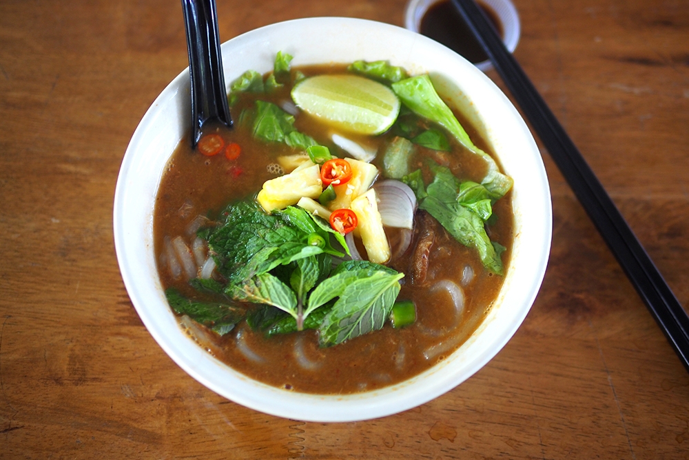 Tangy, thick Penang-style 'assam laksa' is also served here