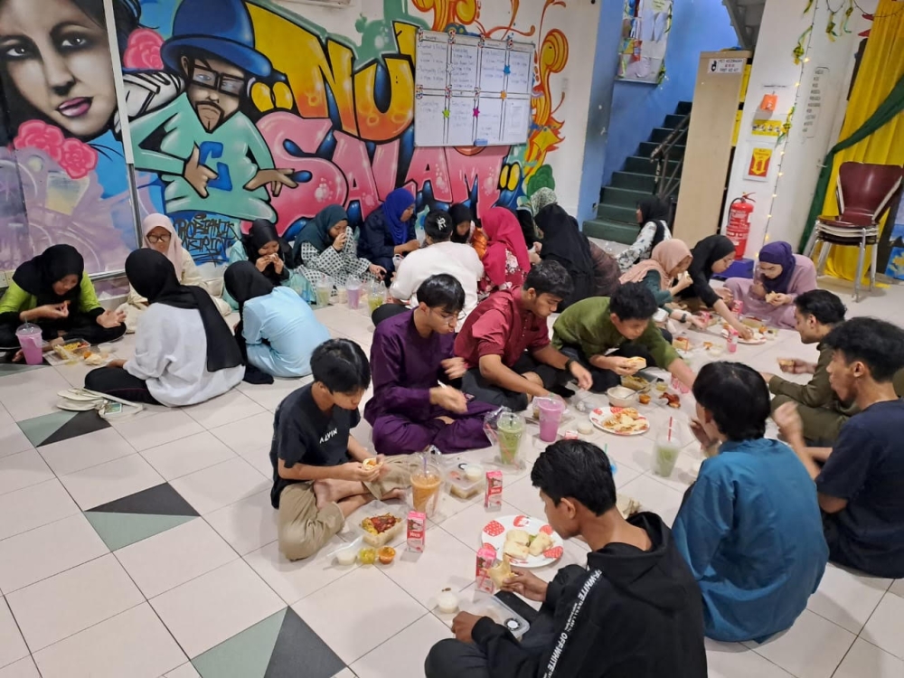 Children break fast during the fasting month of Ramadan with hot meals provided by Yayasan Chow Kit. — Picture courtesy of Yayasan Chow Kit 