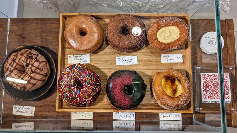 Interesting flavours at Donut Plan. Peep the marmite flavour! — Pictures by Ethan Lau