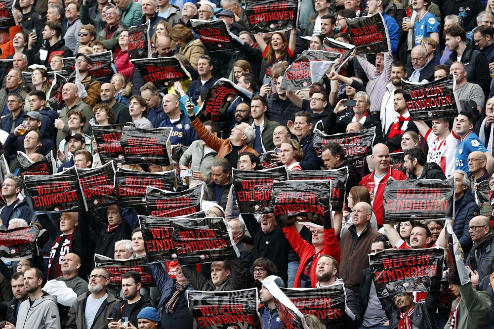 PSV’s supporters attend the Dutch Eredivisie football match between PSV Eindhoven and Ajax at the at the Phillips stadium in Eindhoven on April 23, 2023. — AFP pic