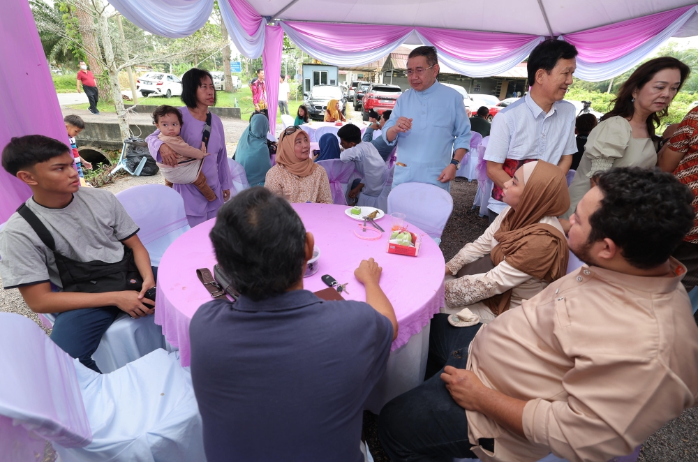 Domestic Trade and Cost of Living Minister Datuk Seri Salahuddin Ayub speaks to guests attending the open house at his residence in Tanjung Piai, Pontian April 24, 2023. — Bernama pic