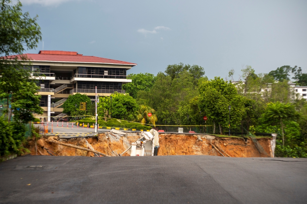 A view of the andslide in front of Malaysian Anti-Corruption Academy (Maca) and Malaysian Institute of Integrity (IIM) resulting in the collapse of a command post at Persiaran Tuanku Syed Sirajuddin April 25, 2023. — Picture by Shafwan Zaidon