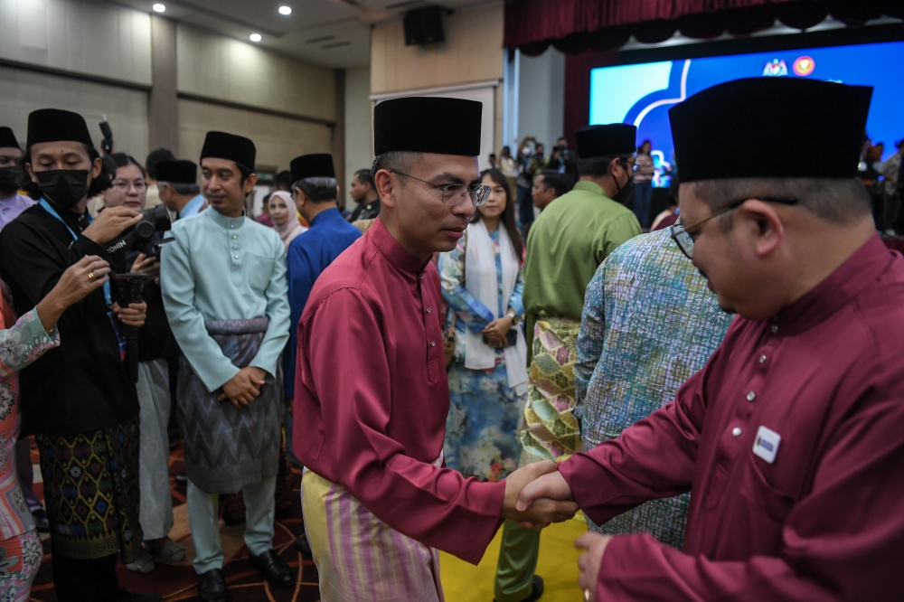 Communications and Digital Minister Fahmi Fadzil greets guests at the Malaysia Madani Open House at Hotel Raia, Alor Setar April 29, 2023. — Bernama pic