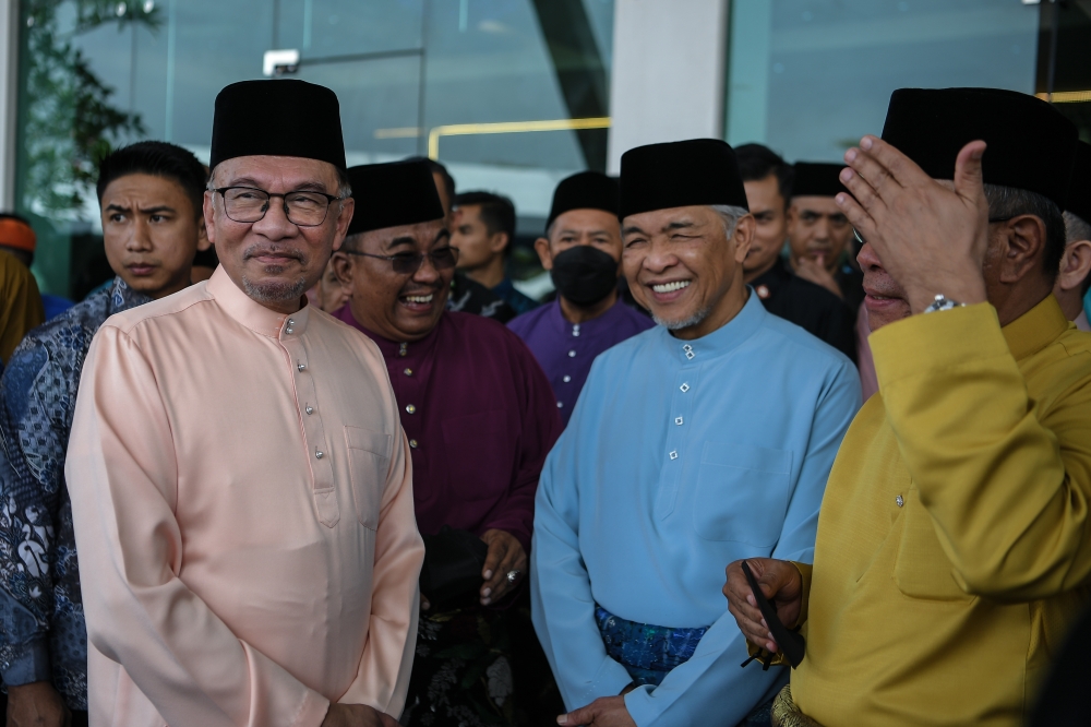 Prime Minister Datuk Seri Anwar Ibrahim and Deputy Prime Minister Datuk Seri Ahmad Zahid Hamidi at the Kedah Madani open house yesterday. — Bernama pic