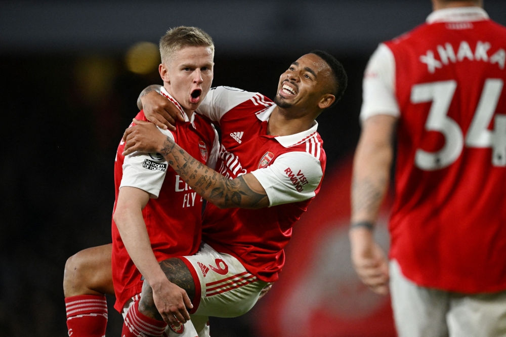 Arsenal's Gabriel Jesus celebrates with Oleksandr Zinchenko after scoring the third goal against Chelsea May 3, 2023. ― Reuters pic