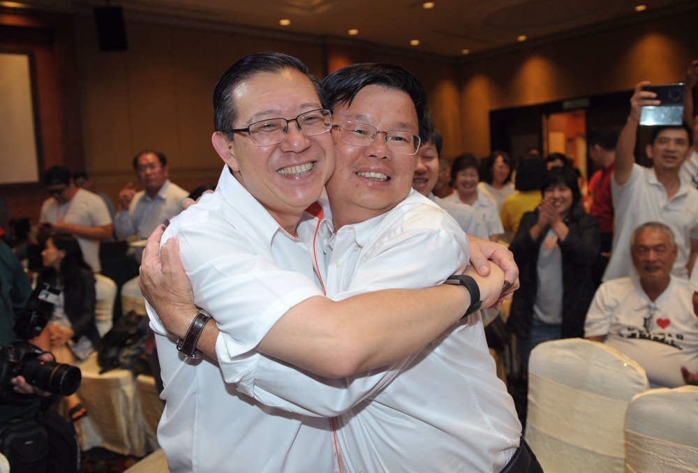 File picture shows Lim Guan Eng and Chow Kon Yeow congratulating each other at the tallying center, May 9, 2018. — Picture by KE Ooi