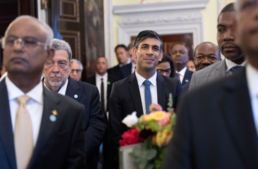 British Prime Minister Rishi Sunak stands with Commonwealth Leaders at Marlborough House, London, Britain May 5, 2023. ― Reuters pic