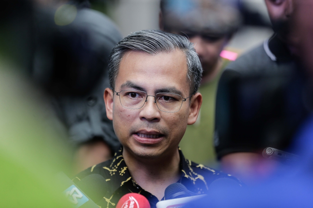 Minister of Communication Fahmi Fadzil speaks to the press during the 2023 Raya With Fluencers here at Telekom Museum. — Picture by Sayuti Zainudin