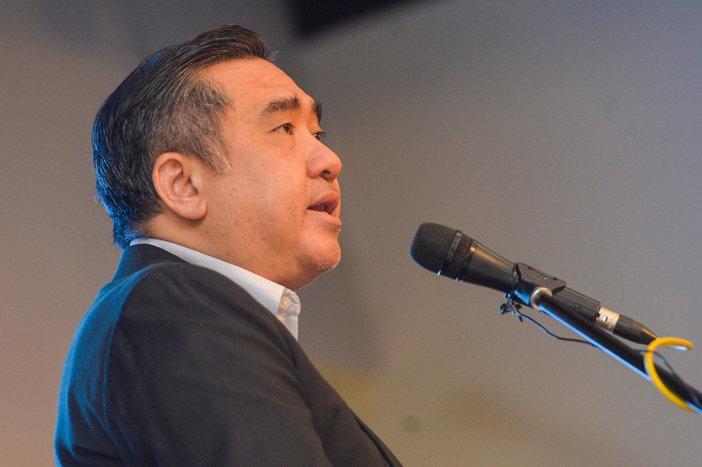 Anthony Loke speaking at the Transport Ministry's Hari Raya event in Putrajaya, May 9, 2023. — Picture by Miera Zulyana