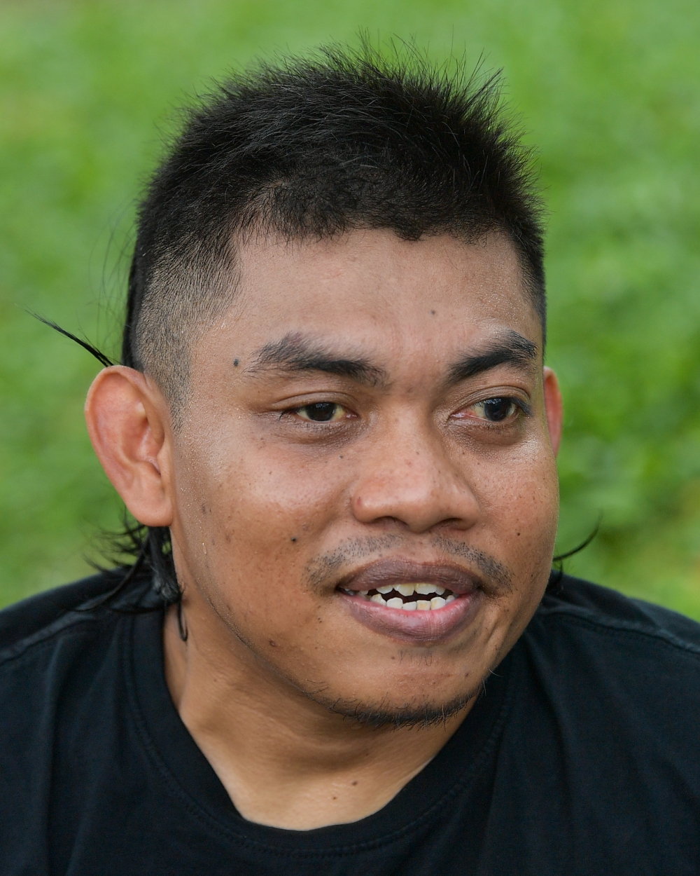 National blind footballer Mohd Azwan Azhar speaks to reporters after a training session in Kuala Lumpur May 12, 2023. — Bernama pic