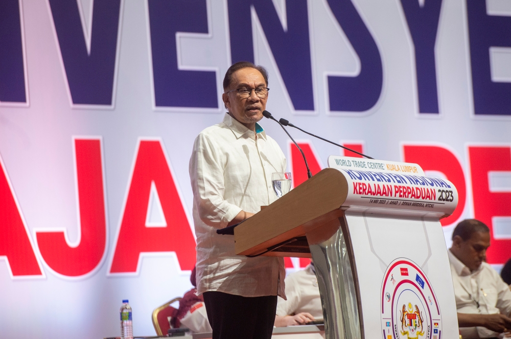 Pakatan Harapan chairman Datuk Seri Anwar Ibrahim delivers his speech during the Unity Government National Convention at World Trade Centre Kuala Lumpur May 14, 2023. — Picture by Firdaus Latif