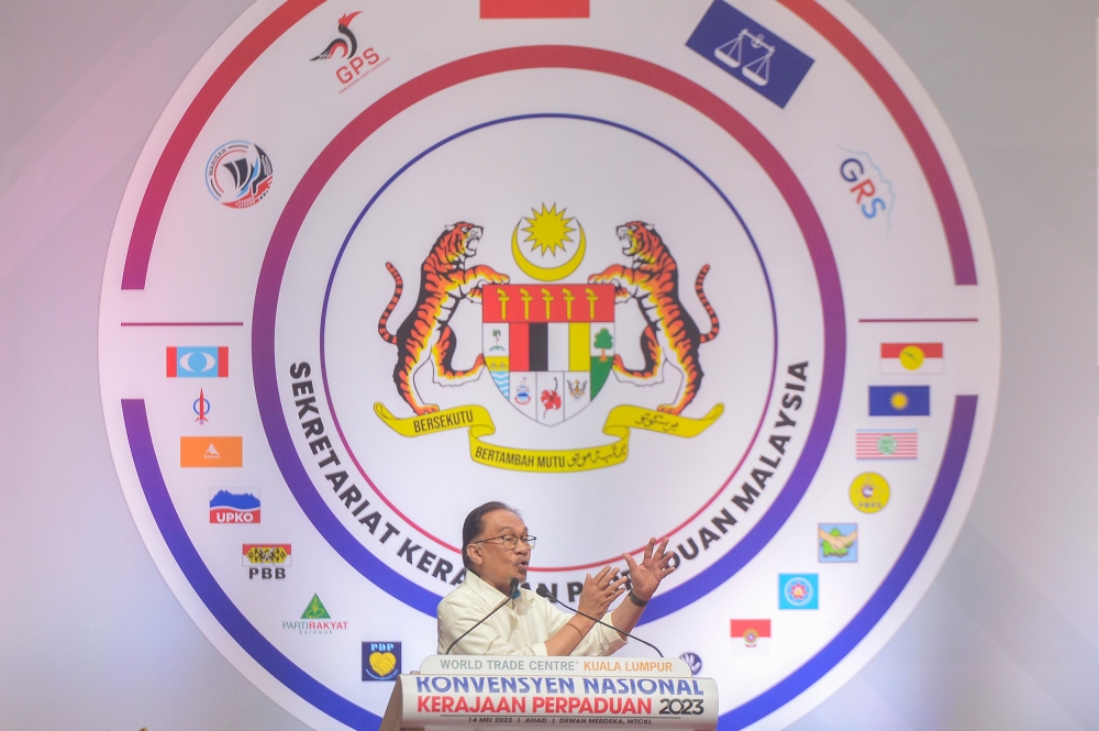 Pakatan Harapan chairman Datuk Seri Anwar Ibrahim delivers his speech during the Unity Government National Convention at World Trade Centre Kuala Lumpur May 14, 2023. — Picture by Firdaus Latif