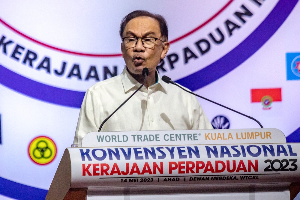 Pakatan Harapan chairman Datuk Seri Anwar Ibrahim delivers his speech during the Unity Government National Convention at World Trade Centre Kuala Lumpur May 14, 2023. — Picture by Firdaus Latif