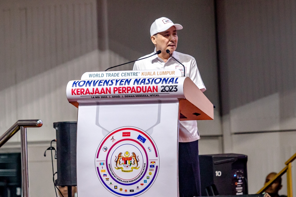 Gabungan Rakyat Sabah (GRS) chairman Datuk Seri Hajiji Noor speaks during the Unity Government National Convention at World Trade Centre Kuala Lumpur May 14, 2023. — Picture by Firdaus Latif