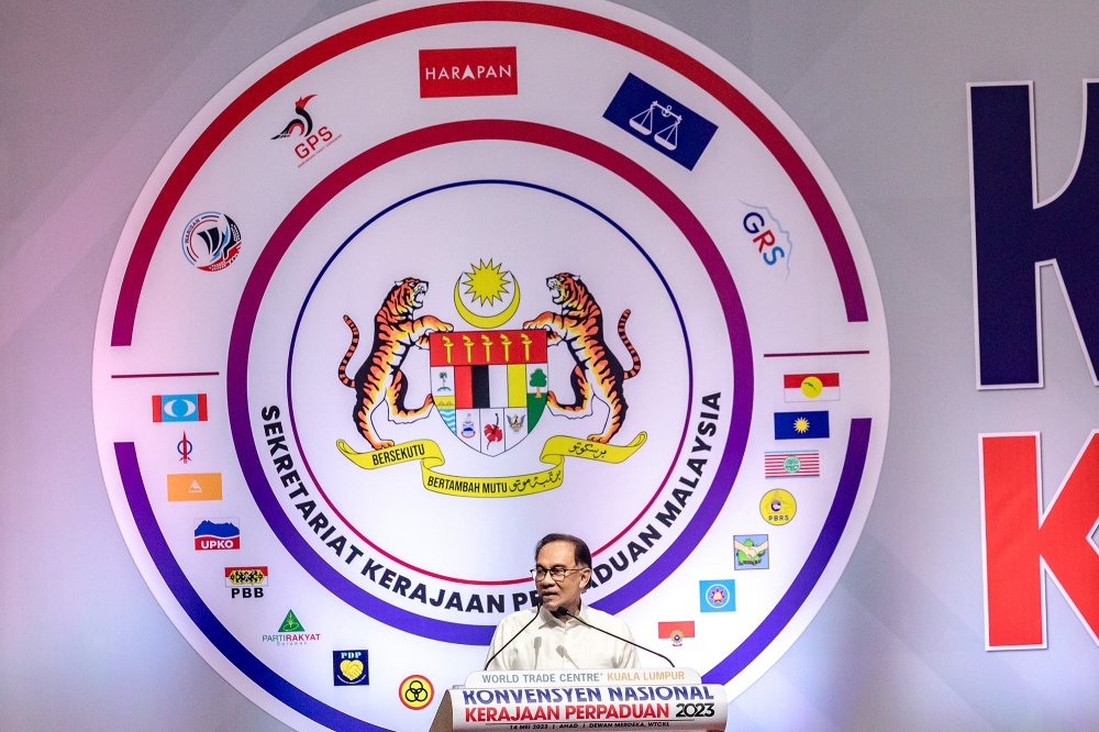 Prime Minister Datuk Seri Anwar Ibrahim delivers speech during the Unity Government National Convention at World Trade Centre Kuala Lumpur May 14, 2023. — Picture by Firdaus Latif