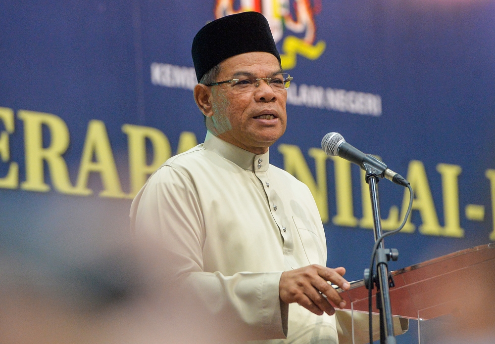 Minister of home affair, Datuk Seri Saifuddin Nasution speaking during Majlis Sambutan Hari Raya KDN Madani at Serdang on May 15,2023. — Picture by Miera Zulyana