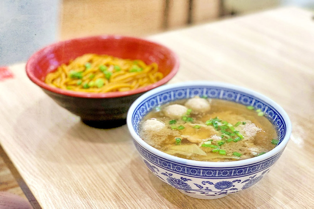 Dry pork noodles with 'loh shu fun' (rat’s tail noodles).