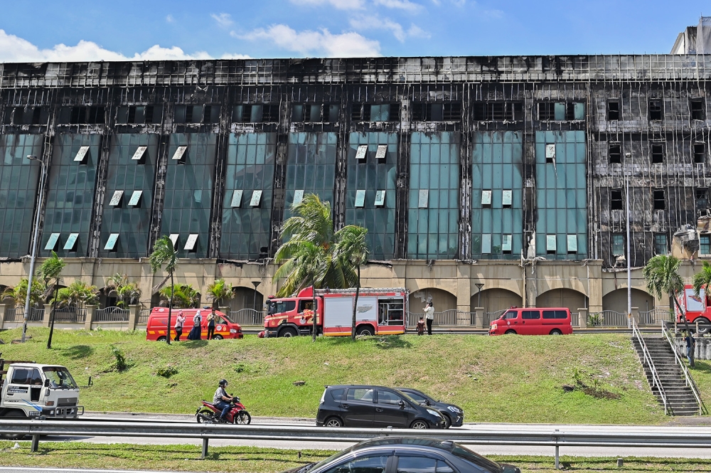 A Selangor Fire and Rescue Department spokesman said that the fire, which broke out on the fourth and fifth floors, was successfully contained by firemen at 11.08am. — Picture by Miera Zulyana