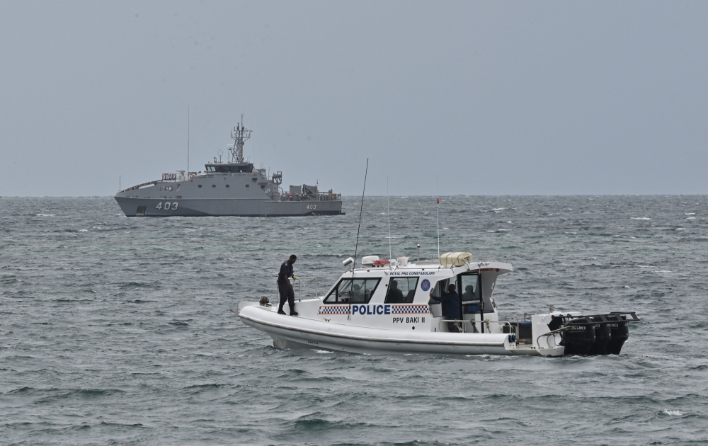 Security was high in the capital with officers patrolling nearby waters on speedboats and jet skis. — AFP pic