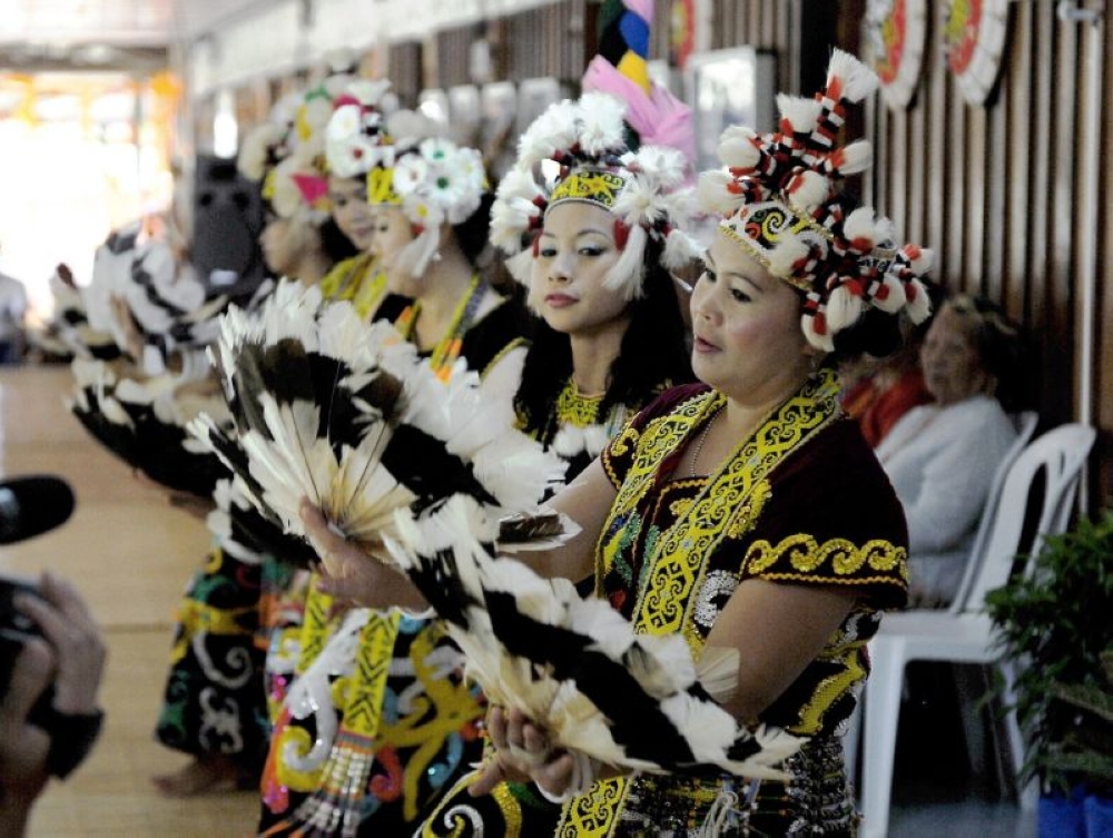 Ladies dress up in in the traditional Dayak costume in conjunction with Gawai Dayak celebrations which is celebrated in Sarawak on June 1 every year. ― Bernama file pic