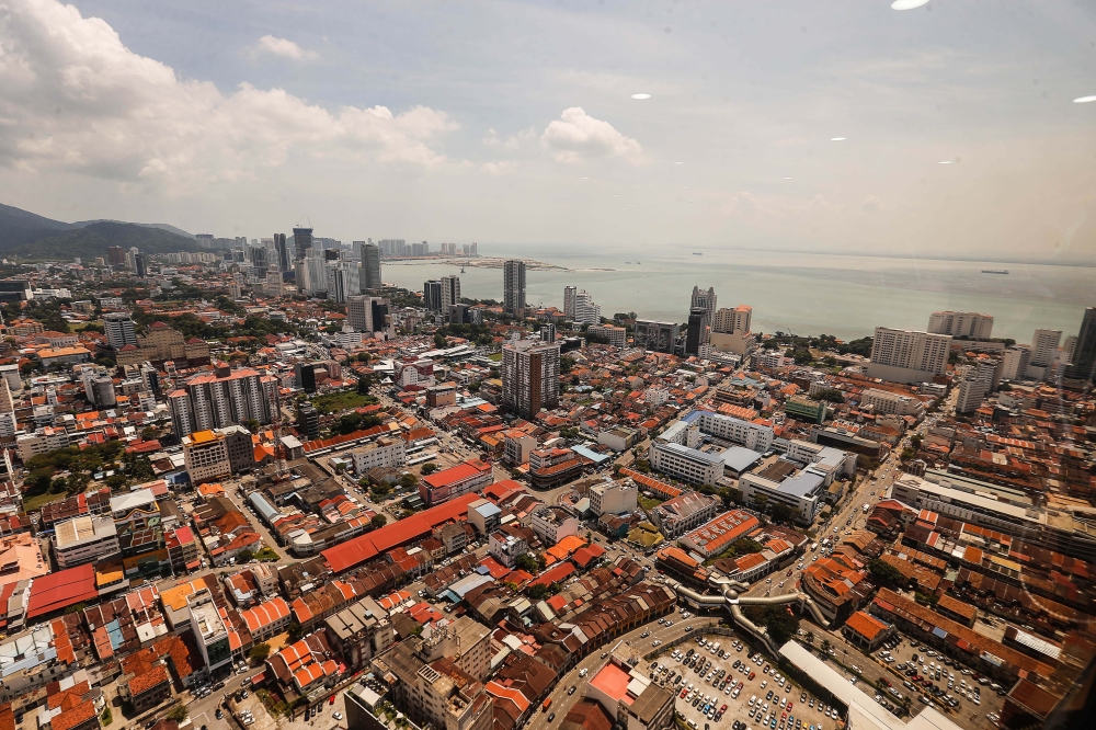 An aerial view of George Town. DAP’s Lim Guan Eng has urged Penangites to lodge police reports against Kedah Menteri Besar Muhammad Sanusi Md Nor for his recent claims. ― Picture by Sayuti Zainudin