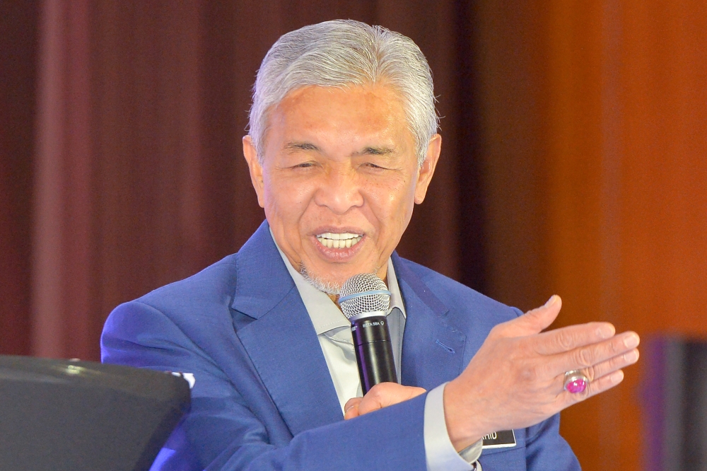 Deputy Prime Minister Datuk Seri Ahmad Zahid Hamidi speaks during a townhall session at the Ministry of Rural and Regional Development in Putrajaya May 31, 2023. — Picture by Shafwan Zaidon 