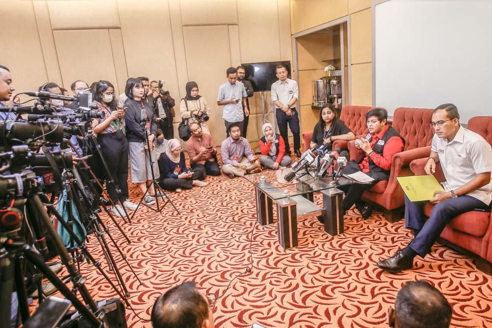 Minister in the Prime Minister’s Department (Law and Institutional Reform) Datuk Seri Azalina Othman Said (centre) speaks at a press conference regarding the Sulu claim case in WTC Kuala Lumpur June 7, 2023. — Picture by Hari Anggara