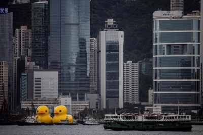 Two giant rubber ducks debut in Hong Kong in bid to drive 'double happiness